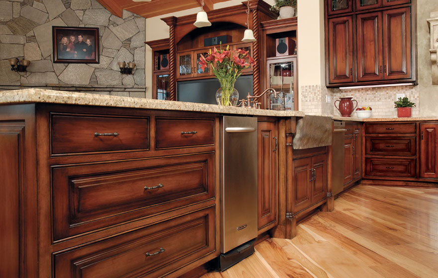 Kitchen with dark wood Tuscany cabinet doors