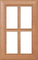 The four panel glass Normandie cabinet door features a smooth curved edge frame and inner bead detail