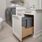 Bottom mount soft close waste container pull-out for two 35 qt bins