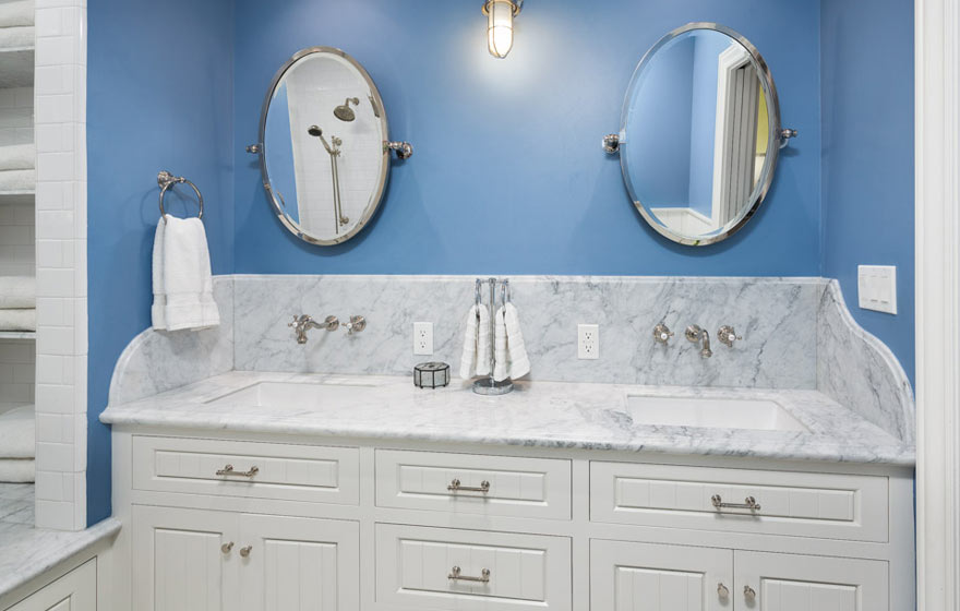 Remodeled bathroom with Century raised panel cabinet doors in white 