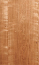 The Emerson slab style unfinished wood veneer door with a MDF core and edge banding is available in various species and wood grains
