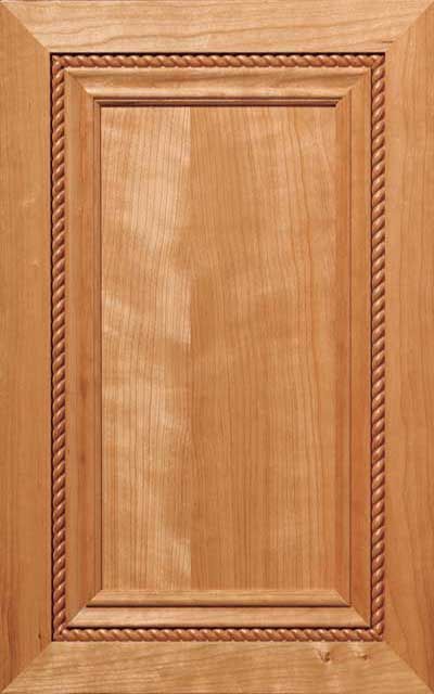Highpointe recessed panel cabinet door with braided accent and applied molding detail