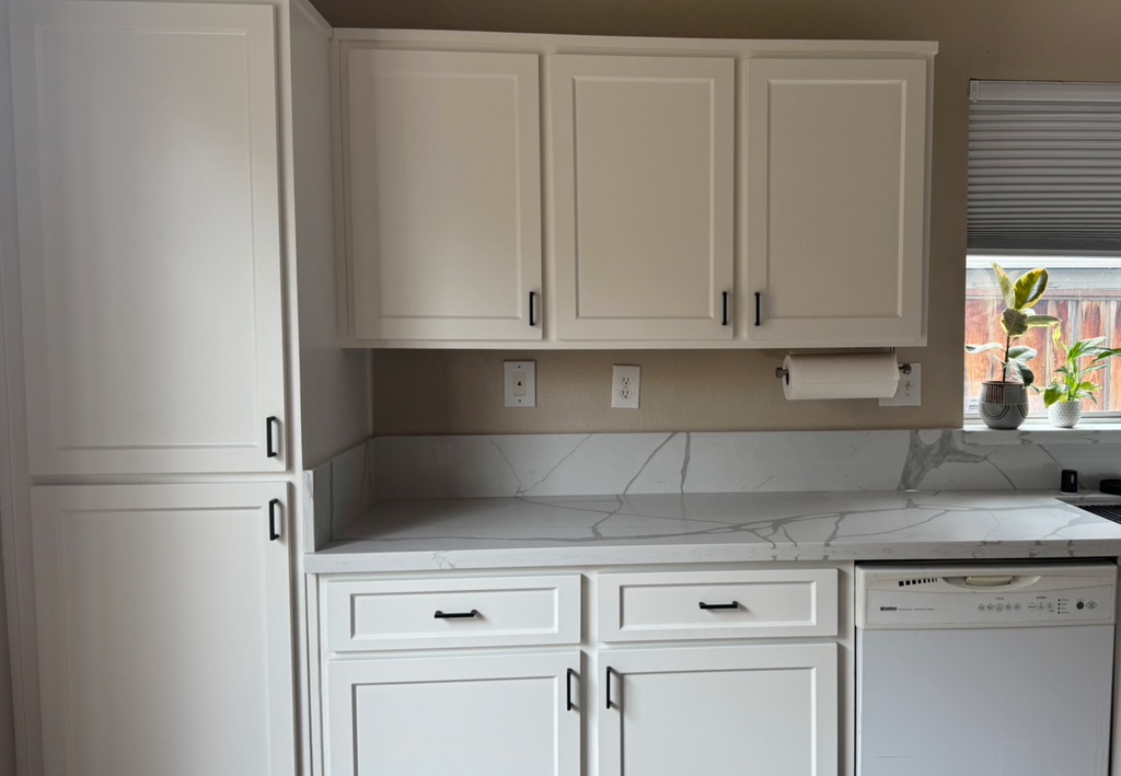 kitchen cabinets that have been refaced with new white shaker style cabinet doors